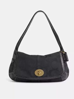 Made in October of 2007 ! The “ERGO” black with Brass hardware ! An investment